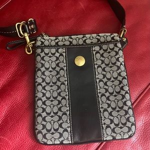 Coach cross body purse.